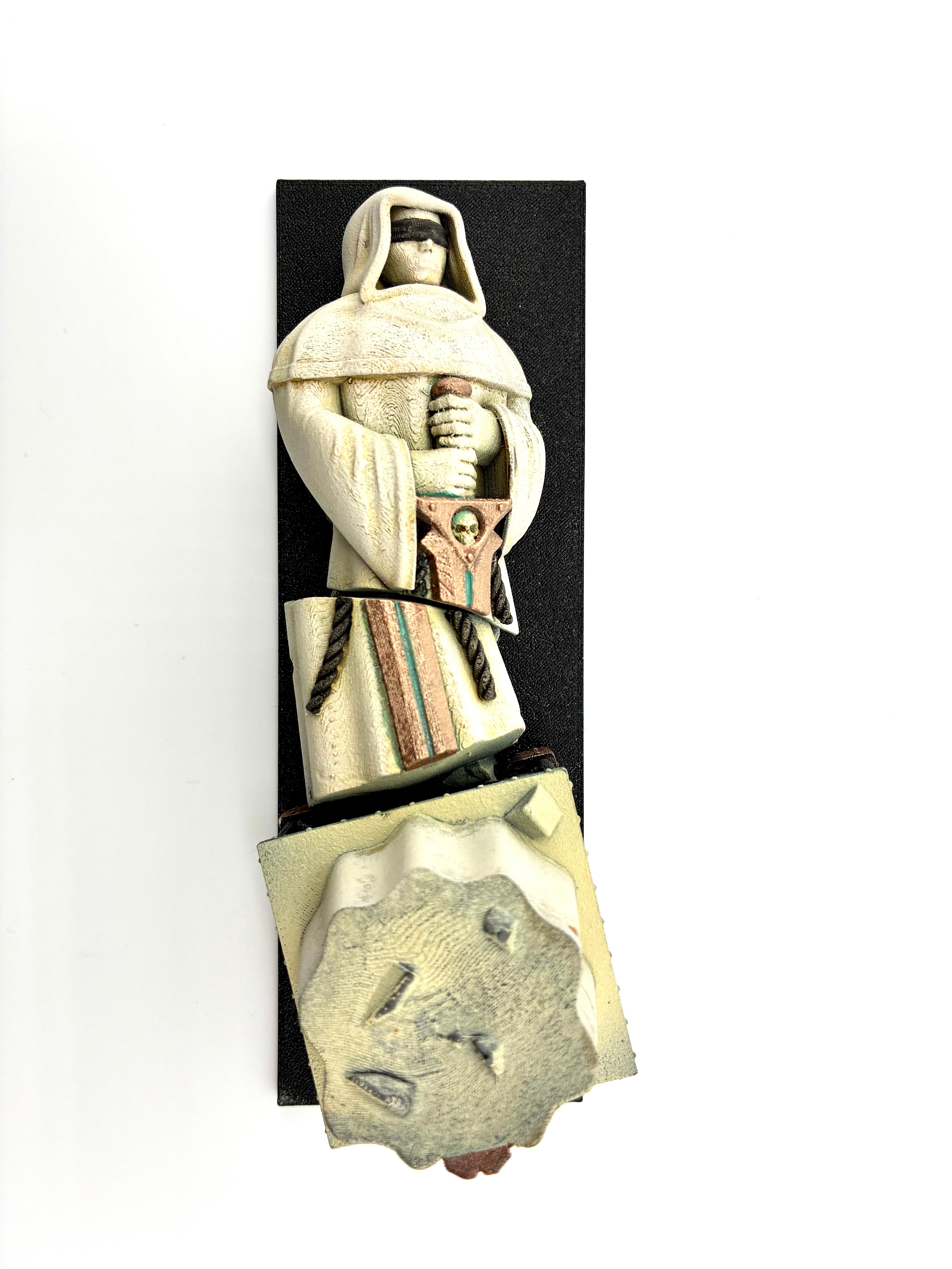 Fallen statue on top to see how it fits a 6"x2" footprint